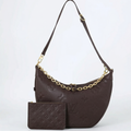 Black handbag with gold chain detail and matching pouch on a white background