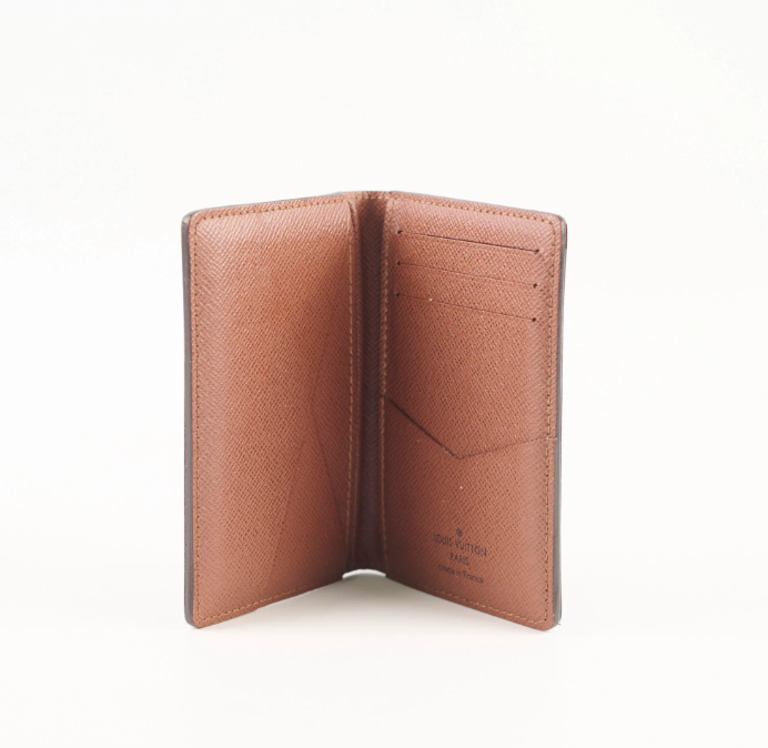 A brown textured wallet shown open, displaying its interior card slots and pocket on a clean white background.