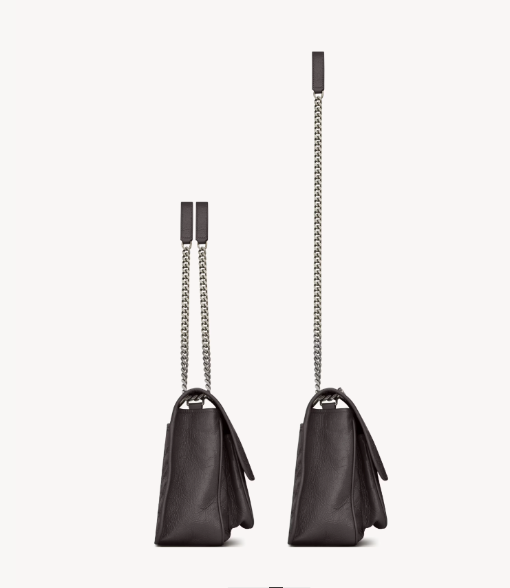 Two black handbags with chain straps on a white background