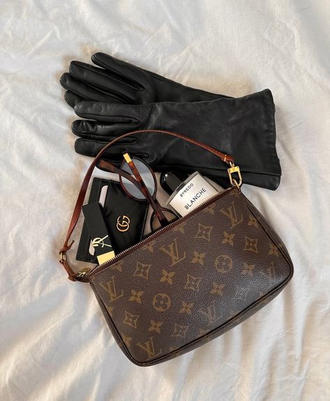 Brown and chocolate checkerboard shoulder bag with dark leather strap, classic 90s style pouch