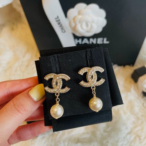 gold crystal earrings with pearl drop pendant, interlocking design, bridal jewellery style