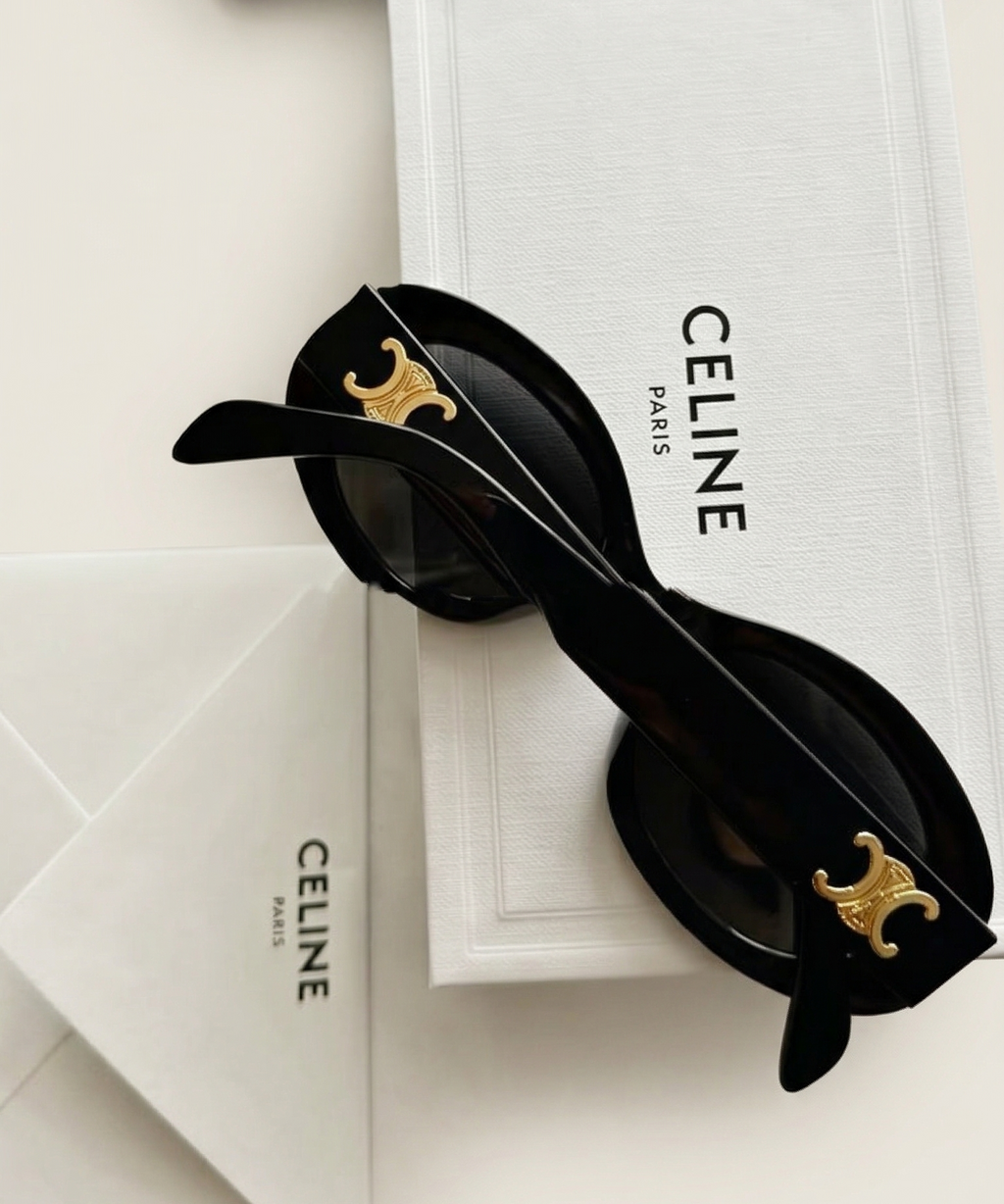 heritage oval black sun glasses 