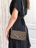 Girl with monogram chain bag