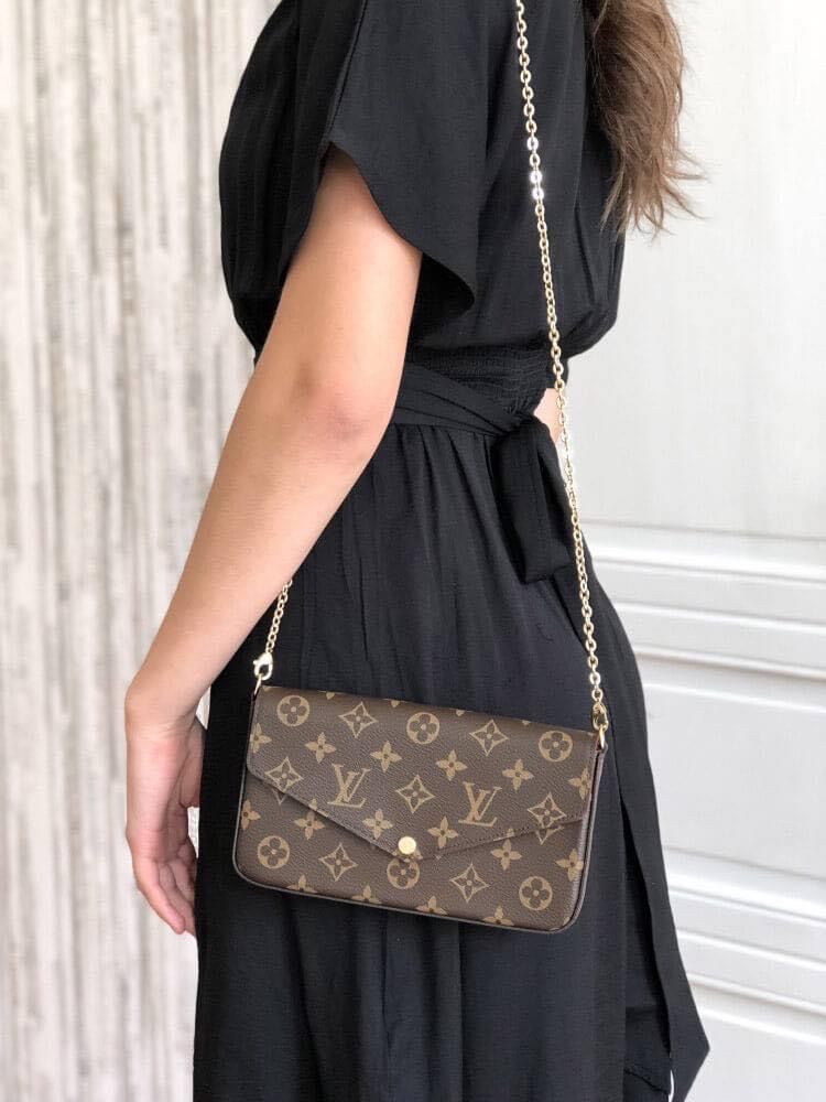 Girl with monogram chain bag