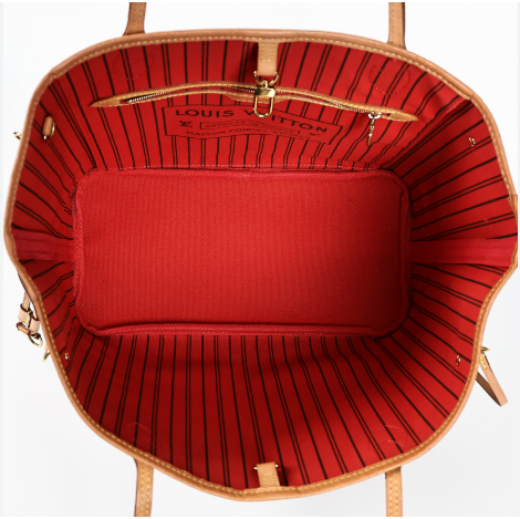 Top-down view of a bag showing a vibrant red interior with thin black pinstripes and tan leather trim.
