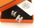 Silver stud earrings with full crystal pave H design, luxury orange box packaging