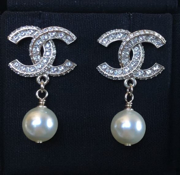 Silver crystal earrings with pearl drop pendant, interlocking design, bridal jewellery style